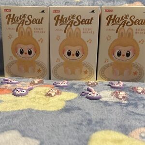 Pop Mart Labubu Have A Seat vinyl face pendant!
